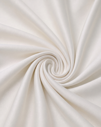 Close-up of white fabric with a swirl pattern