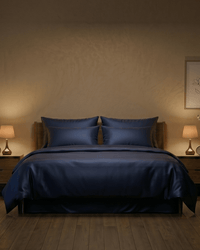 Midnight navy sateen cotton bedsheet on a bed — The Unhurried Life