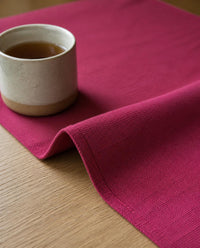 Close-up of mulberry pink cotton canvas weave and stitched edge - The Unhurried Life