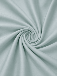 Serene green percale cotton bedsheet folded, showing texture